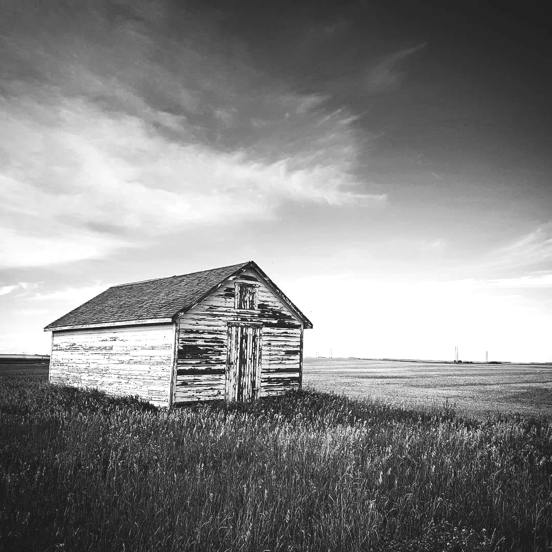 A weathered farm building on the Saskatchewan prairie